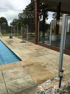 After cleaning glass pool fence Geelong